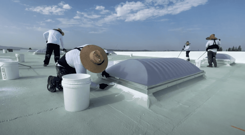 Silicone roof coating on a commercial roof