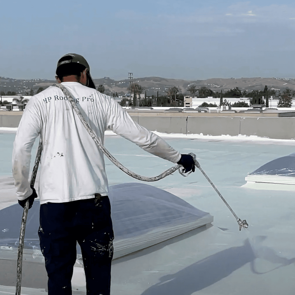 Silicone roof coating on a commercial roof