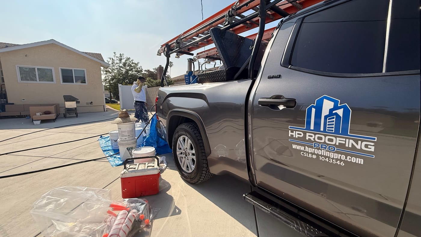 HP Roofing Pro truck on site at a San Gabriel residential roof coating project